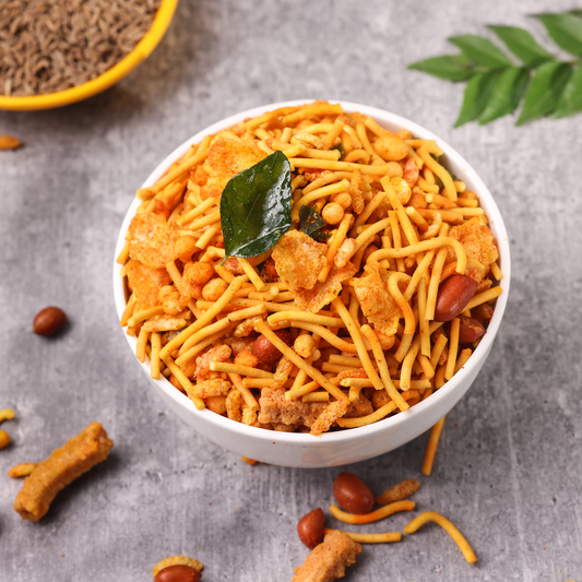 Mysore Mixture in a Traditional Indian Snack Box: "Mysore Mixture presented in a traditional Indian snack box, symbolizing festive Indian cuisine."