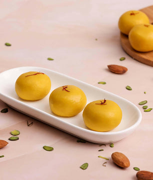 Order delicious Kesar Peda online - quick sweets delivery Buy Sweets Online