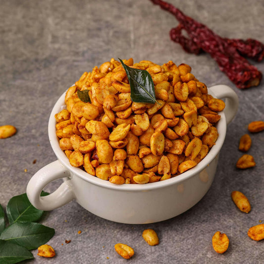 Close-up of Spicy Congress Peanuts: "A close-up view of spicy Congress peanuts, showcasing their crunchy texture and vibrant red chili seasoning."